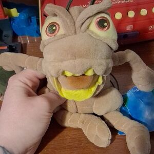 Disney Tan and Yellow Reptile Plush